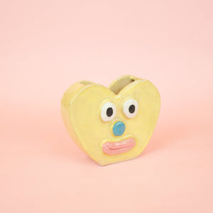 Yellow heart vase w blue nose n pink lips